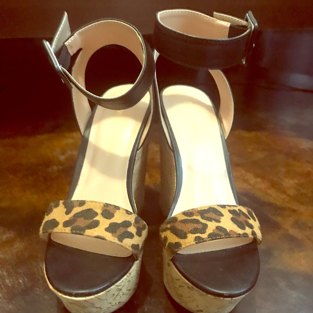 Size 7 black and cheetah wedges